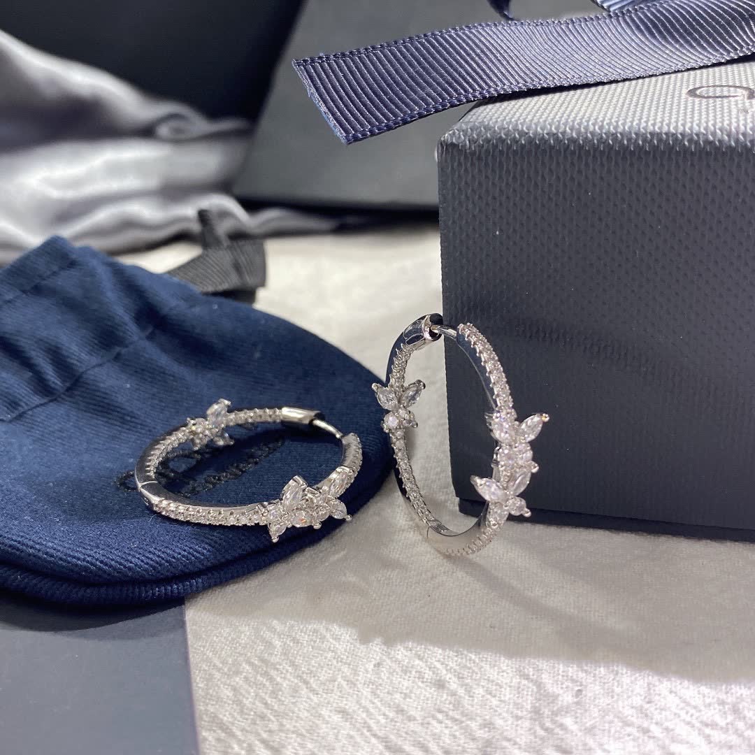 APM Monaco Silver Hoop Earrings with Butterfly Design